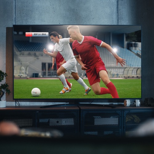black-couple-watches-professional-soccer-match-on-tv-sitting-on-a-couch-at-home-in-the.jpg_s1024x1024wisk20cZoWh6of2IIh2615Ogt8ur9V6VGC8GYzhXcBQTFAwu20